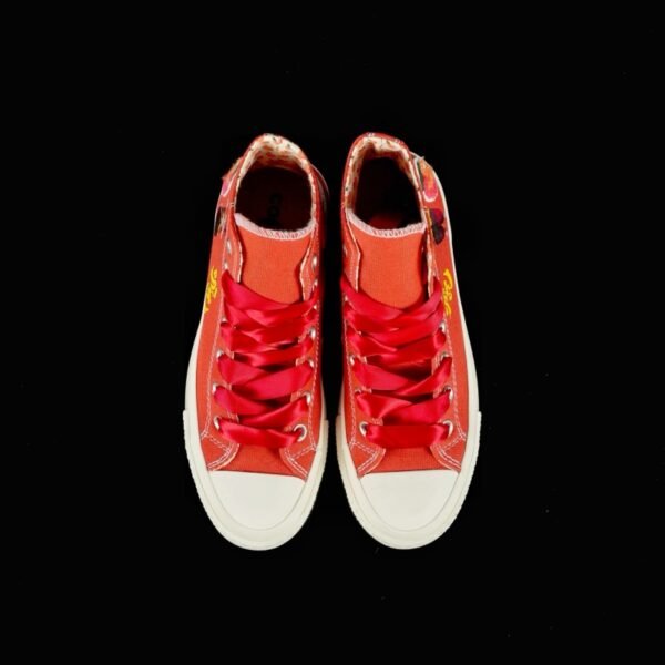 Close-Up of NEZHA Demon Pill Graffiti on Converse 1970s Canvas Shoe